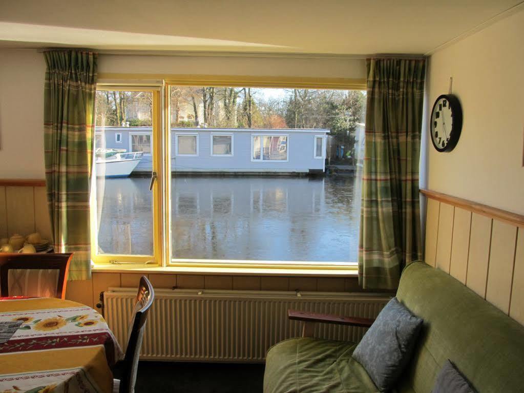 Houseboat Under The Mill Hotel Amsterdam Esterno foto